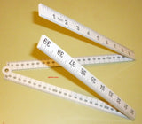 RULER FOLDING 4 FOLD PLASTIC,1 M LONG, CARPENTERS RULER - MM & INCH, BRAND NEW .